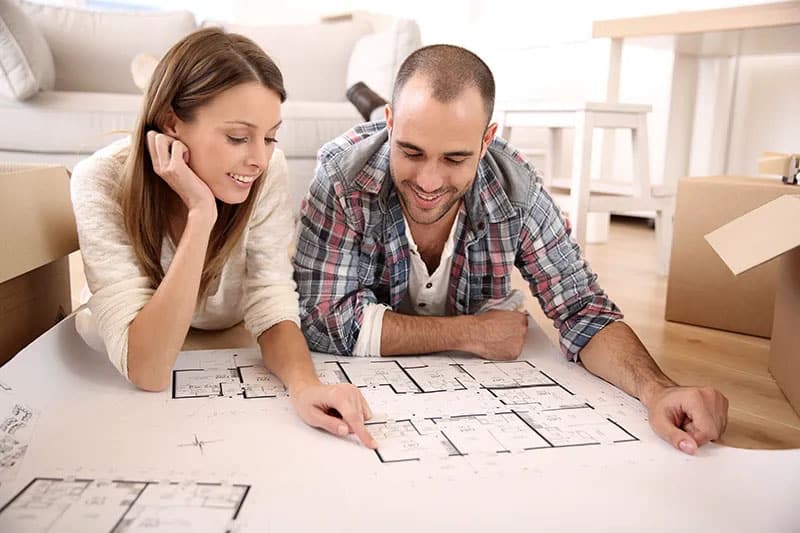 Couple Looking at Floorplans