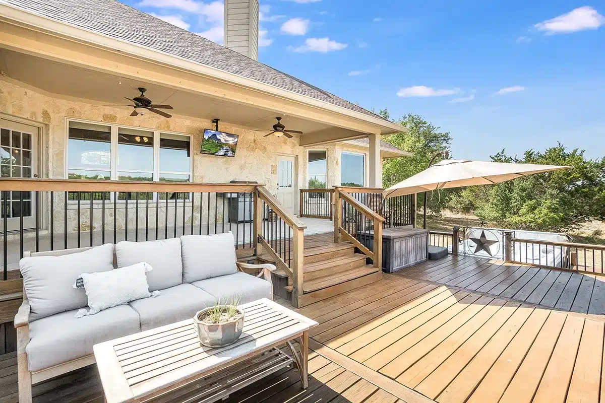 Home with deck and outdoor furniture